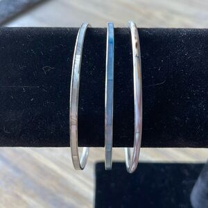 Set of 3 bracelets. Silver tone with inlay